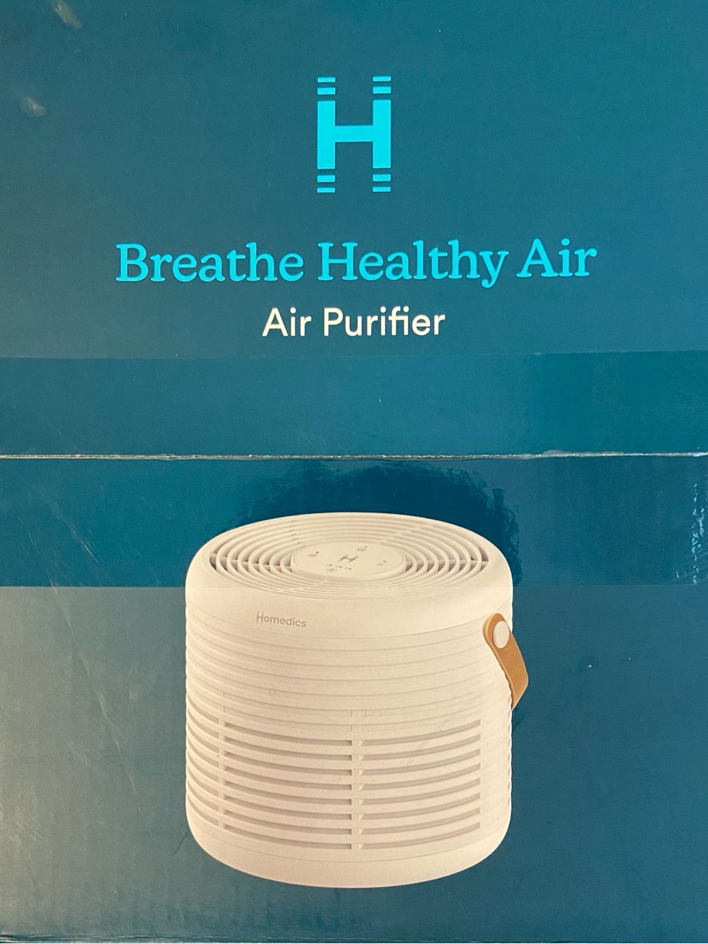 Homedics White Air Purifier with Tan Carry Strap